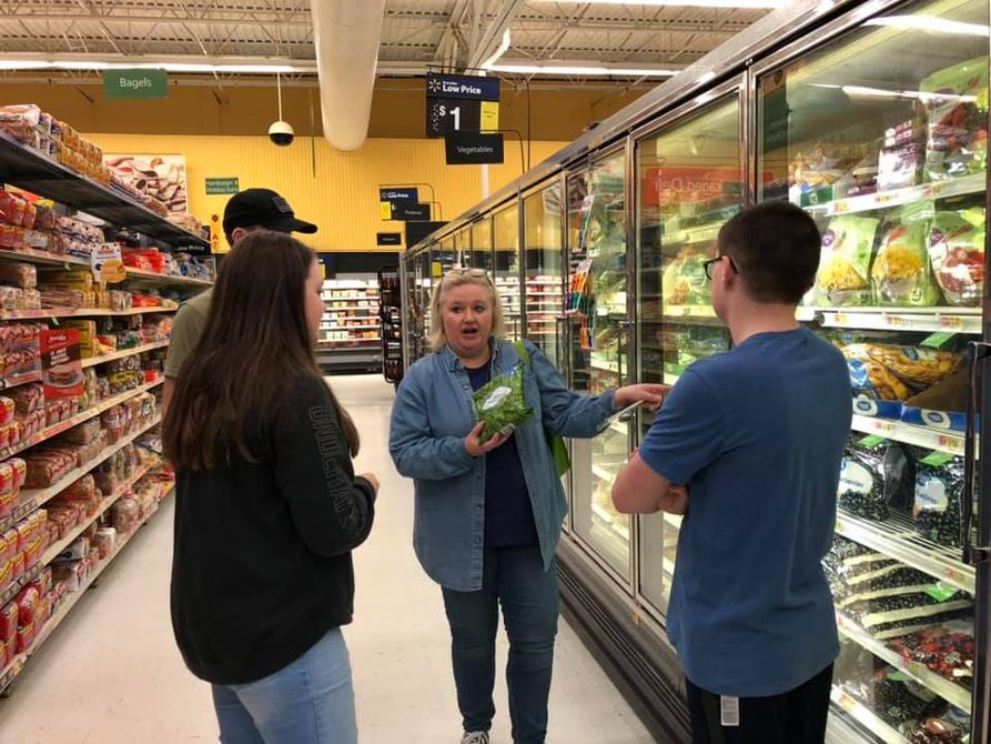 Grocery Tour for Ambassadors in the Freezer Section.