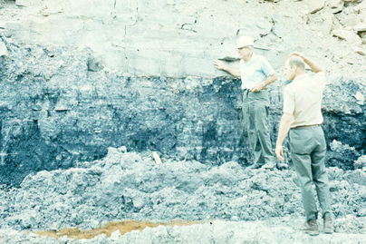 Two men examine the Smith-Bakerstown coal seam.