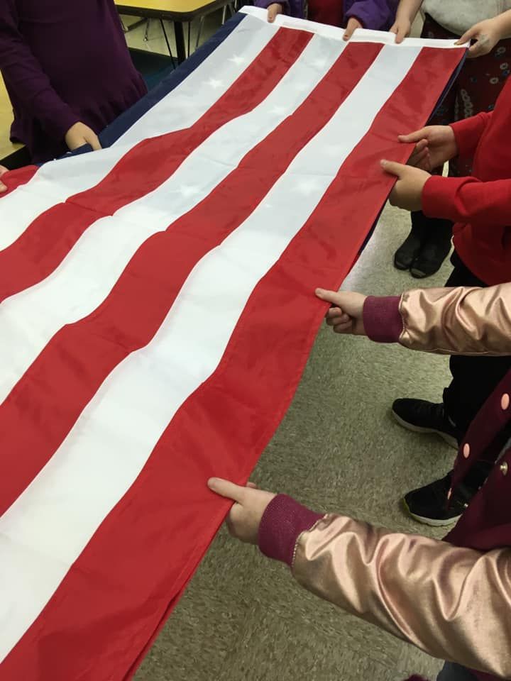 Youth Learn How to Properly Fold the US Flag