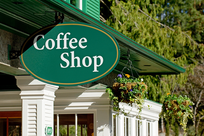 A sign reads "Coffee Shop" representing WVU Extension's Economic Development focus