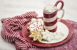 plate with holiday cookies and cocoa image