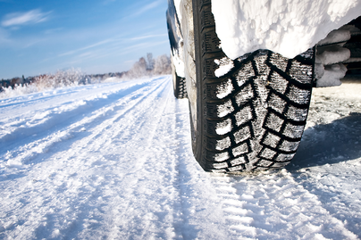 close up of tire on a snowy road