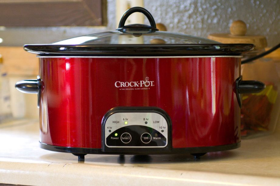 slow cooker on a counter top. 