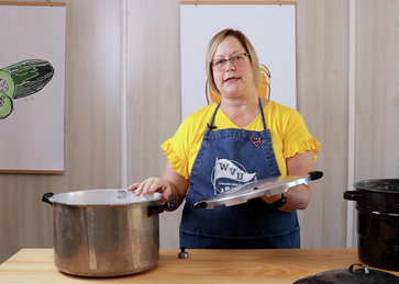 WVU Extension Agent Gina Taylor explains the difference between pressure canners and hot water bath canners in a new video series.