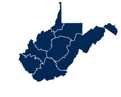 Dark blue map of West Virginia that highlights the tourism regions. 