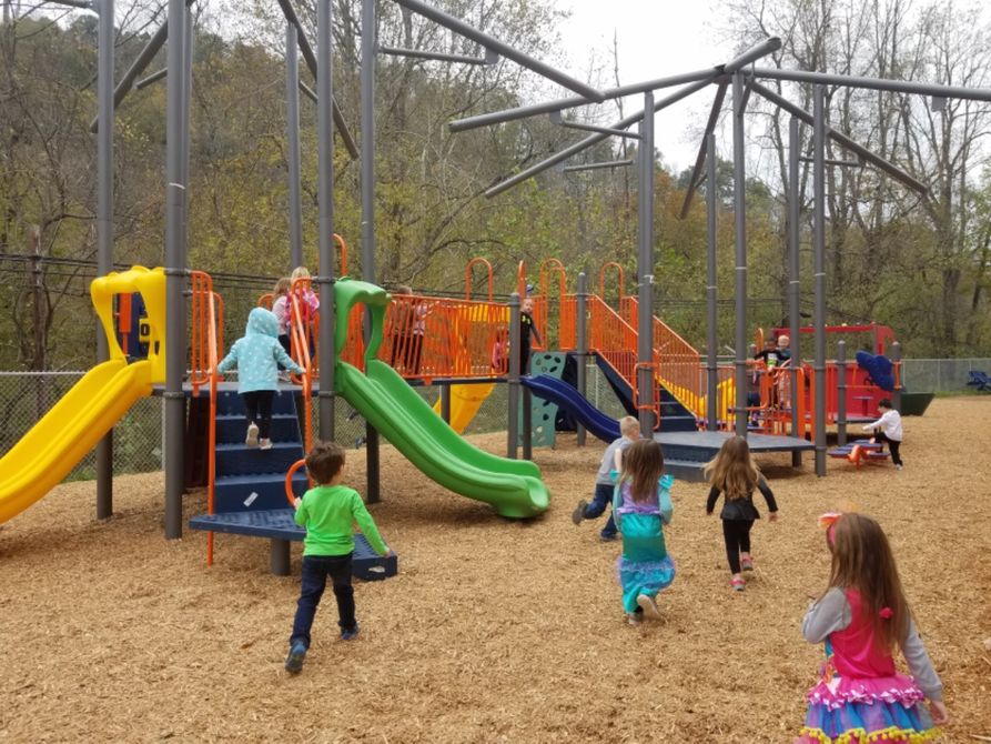 Photo of kids playing on playground
