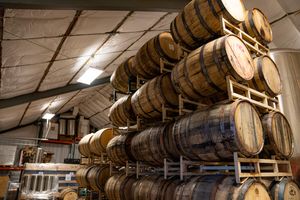 stacks of barrels in a warehouse