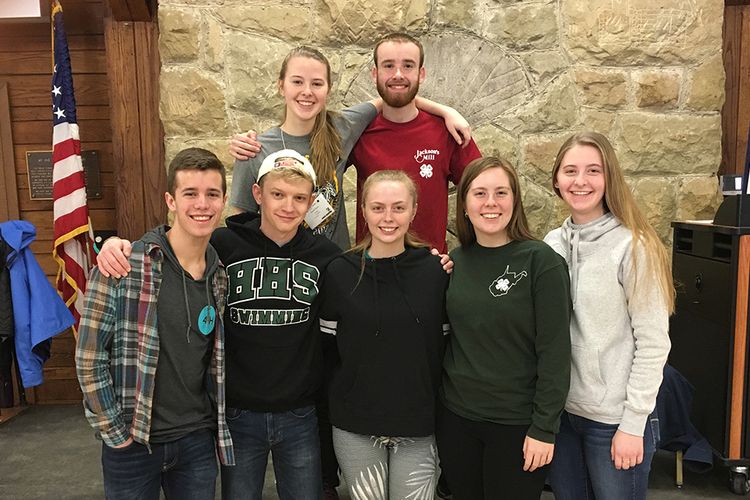 7 teenage 4-Hers pose for photo at Jackson's Mill during Dance Weekend