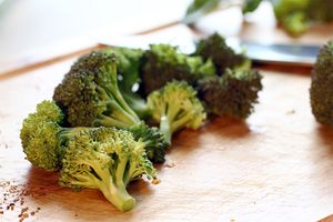 broccoli on a wooden cutting board