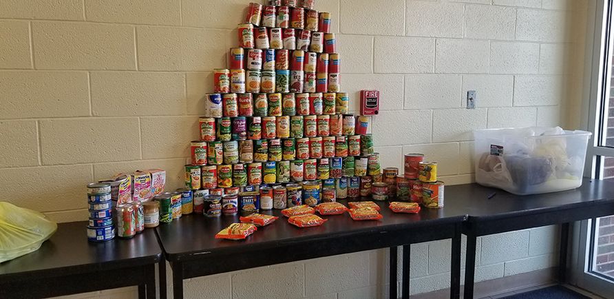 Over 100 cans were collected for the canned food drive during Energy Express's community service event.