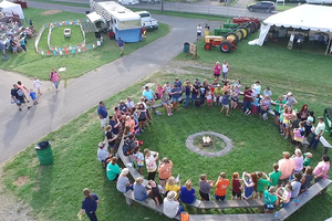 4-H'ers sitting around a council circle at the State Fair 